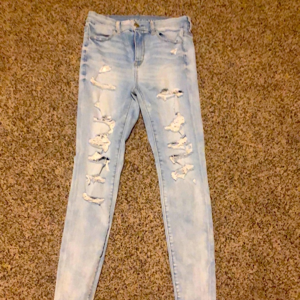 Blue mid-rise ripped jeans